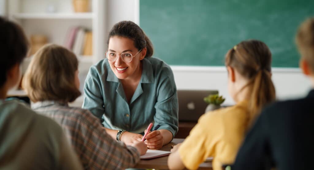 profesores contentos educación exitosa